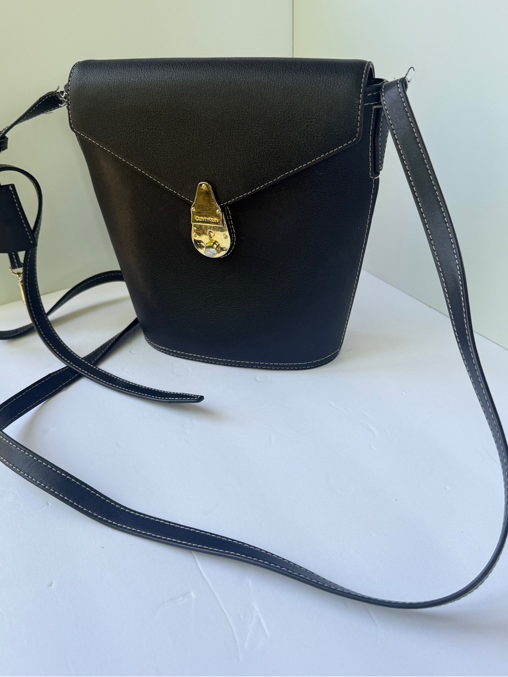 Calvin Klein Bucket Bag Crossbody Black Leather Gold Signature Engraved Pushlock